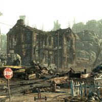 A screenshot of a damaged house and surroundings from Fallout 3.